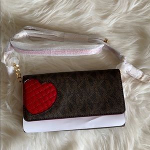 Michael Kors crossbody handbag with signature mk